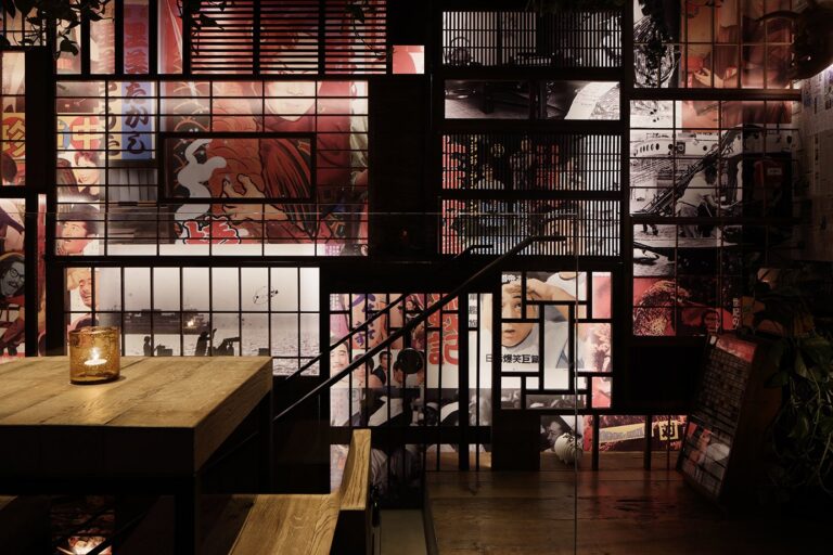 The ICHIBUNS interior on Wardour Street, with lattice screens, Japanese artwork and timber tables