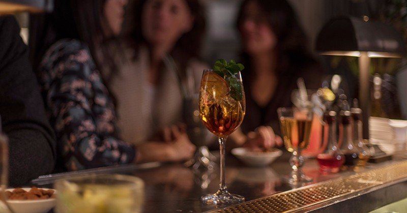 A cocktail on the bar at The Norman